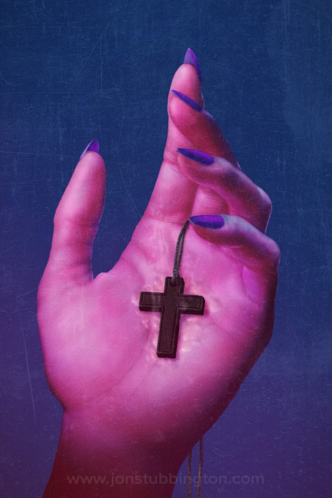 Colourful illustration of a vampire's hand holding a cross with the skin of the hand bubbling and blistering